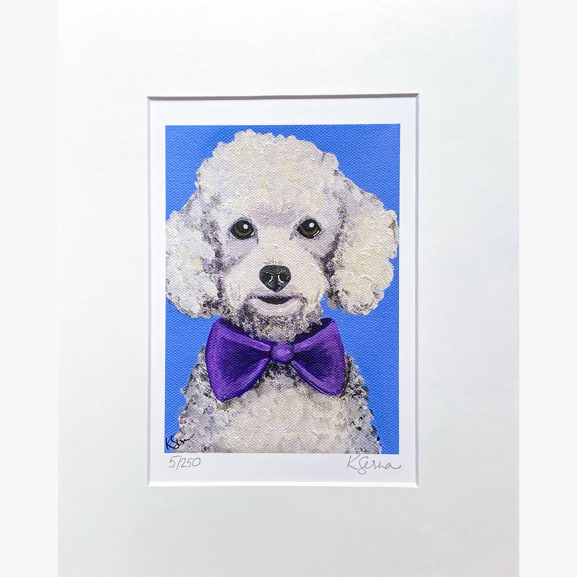 Framed artwork of a dog wearing a purple bow tie on a blue background