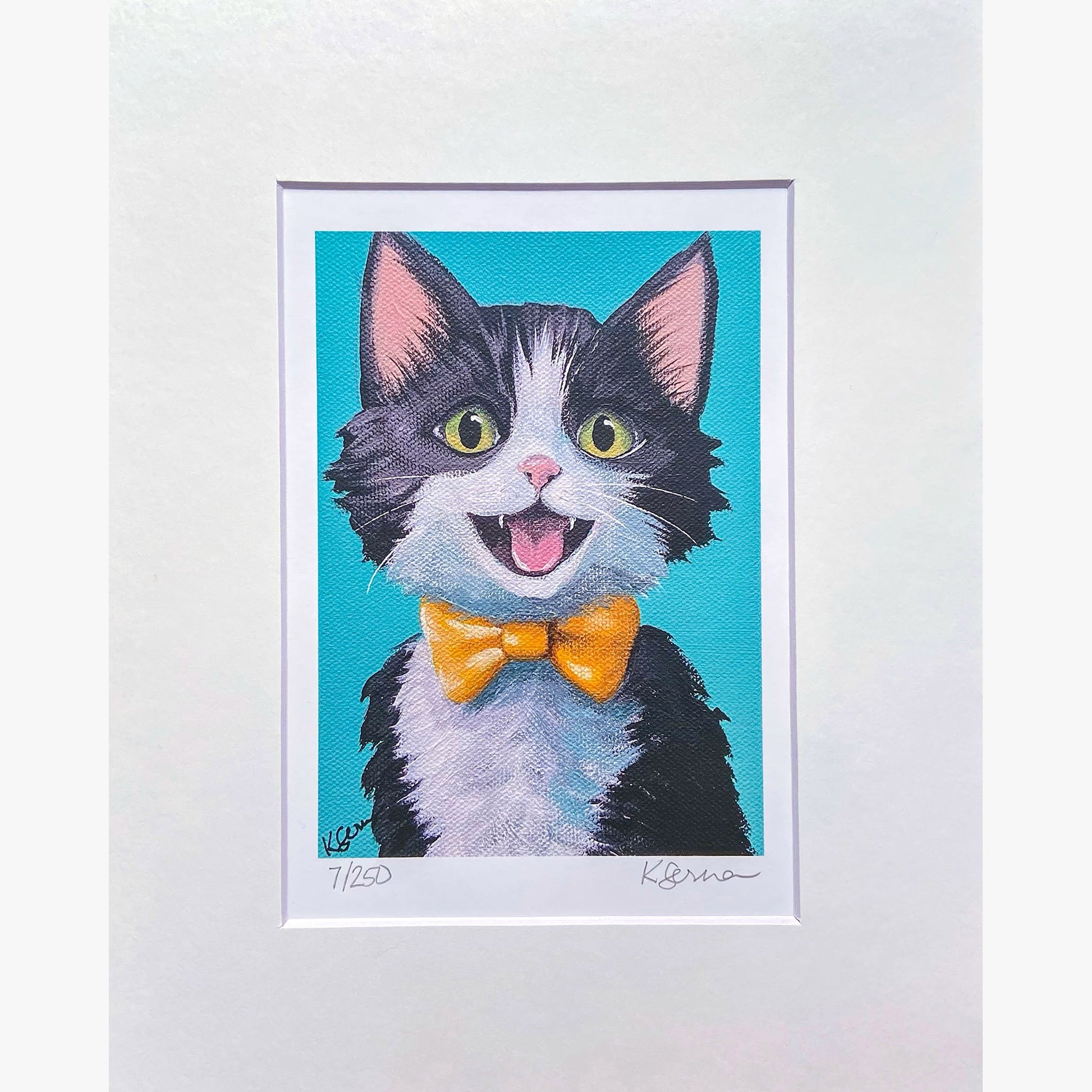 Framed illustration of a cat with a yellow bow tie on a blue background