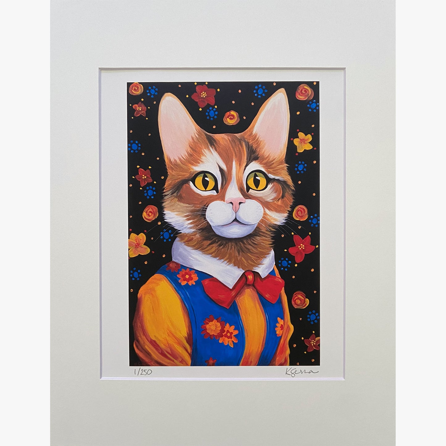 A close-up of a limited edition print featuring Maisie the Cat, a vibrant painting of an expressive orange tabby wearing a blue vest with orange flowers, a yellow shirt, and a red bow tie. The background is a playful black with colorful floral accents. The print is matted with a white border, and the artist's signature and edition number (1/250) are visible at the bottom.