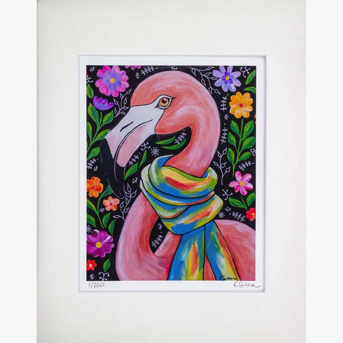 A close-up of a limited edition print featuring Penelope the Flamingo, an elegant pink bird with a poised expression. She wears a vibrant, multicolored striped scarf draped around her neck. The background is deep black, filled with whimsical hand-drawn floral patterns in bright pink, orange, purple, and green. The print is matted with a white border, with the artist’s signature and edition number (1/250) visible at the bottom.