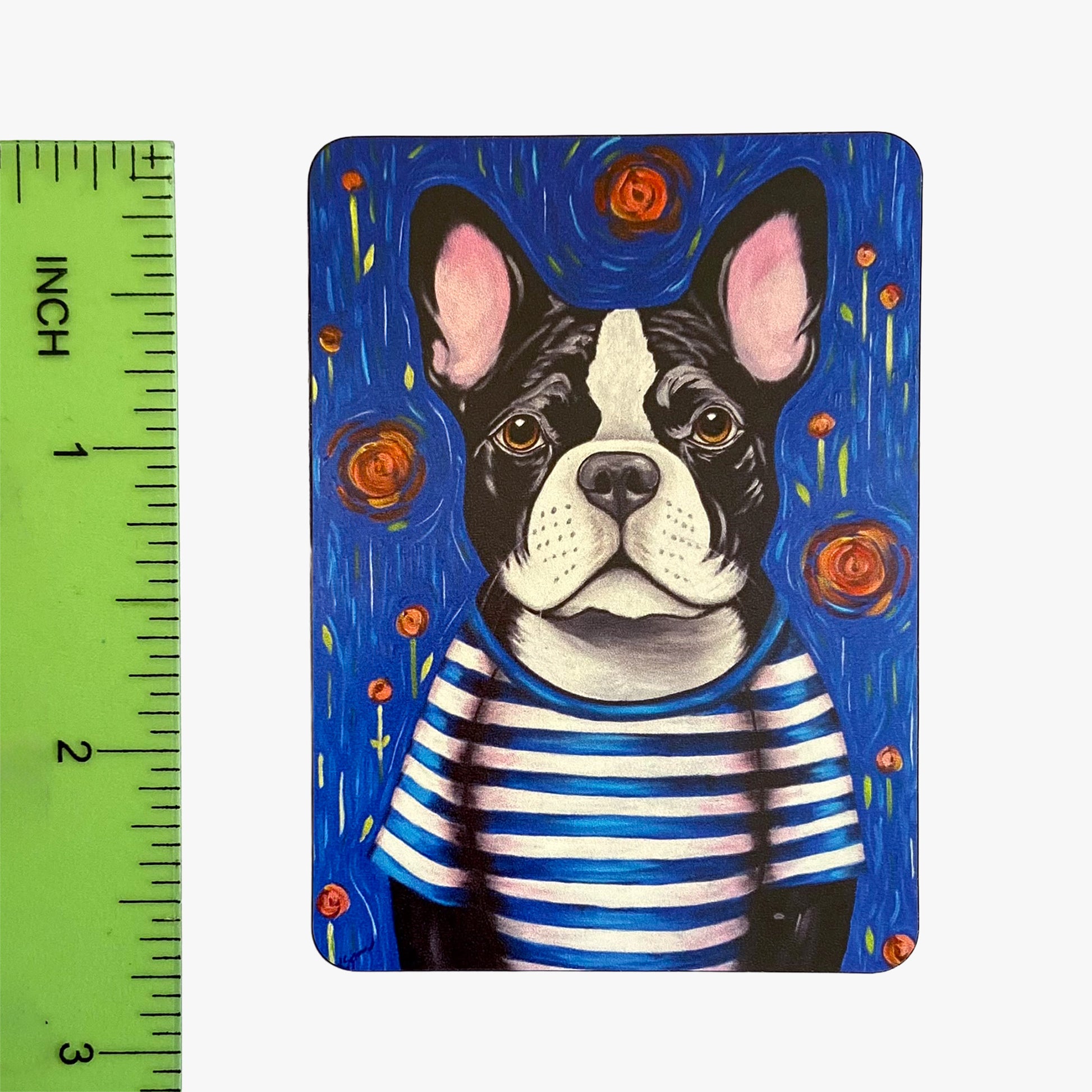Painting of a dog in a striped shirt with a ruler for scale on a white background