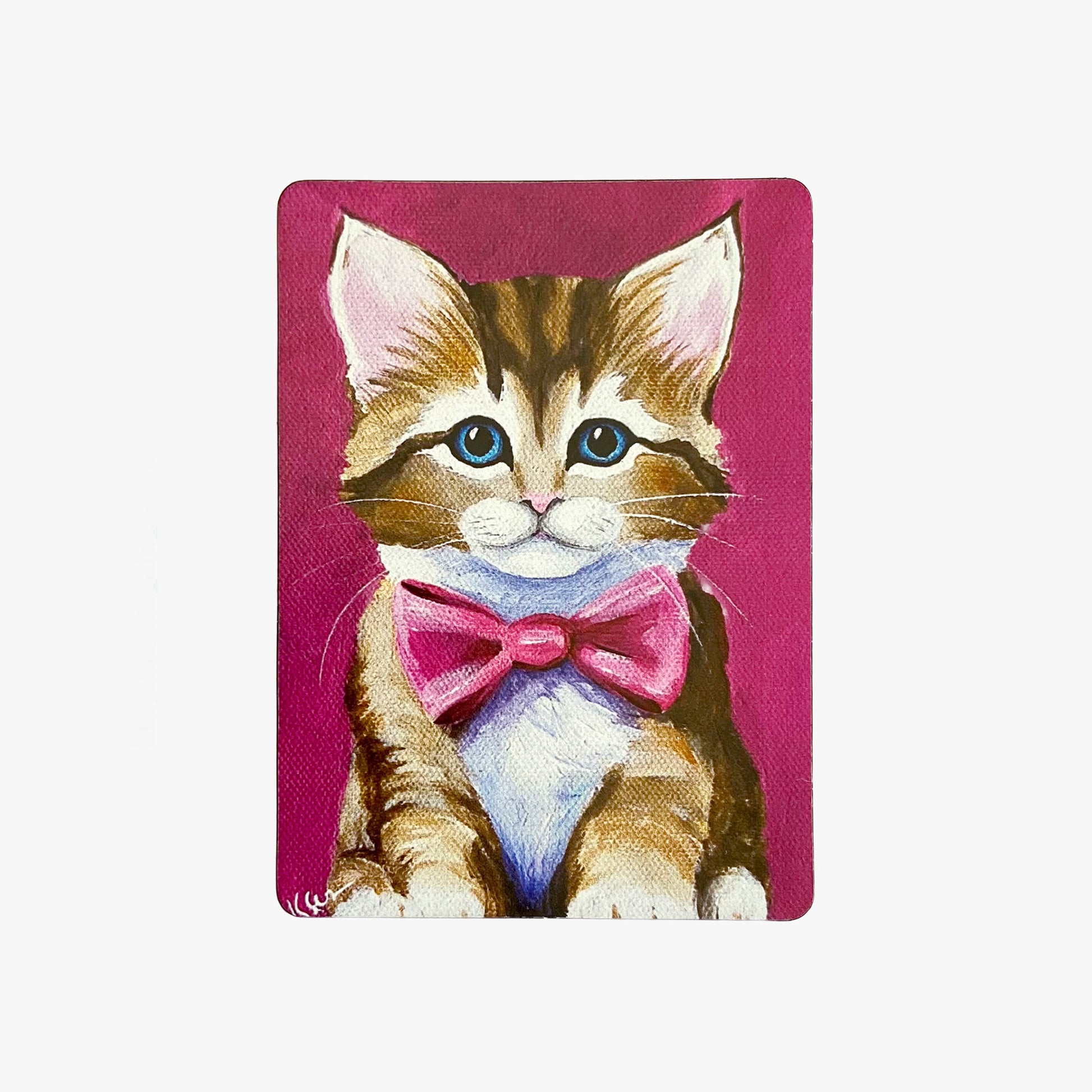 Magnet with a cat wearing a pink bow tie on a pink background