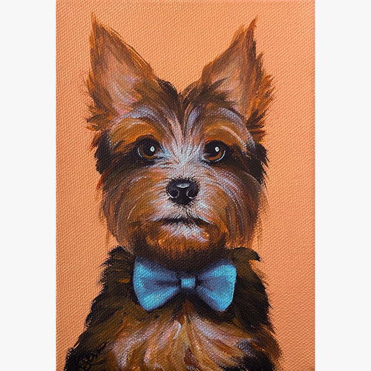 painting of yorkie puppy with blue bowtie and orange background