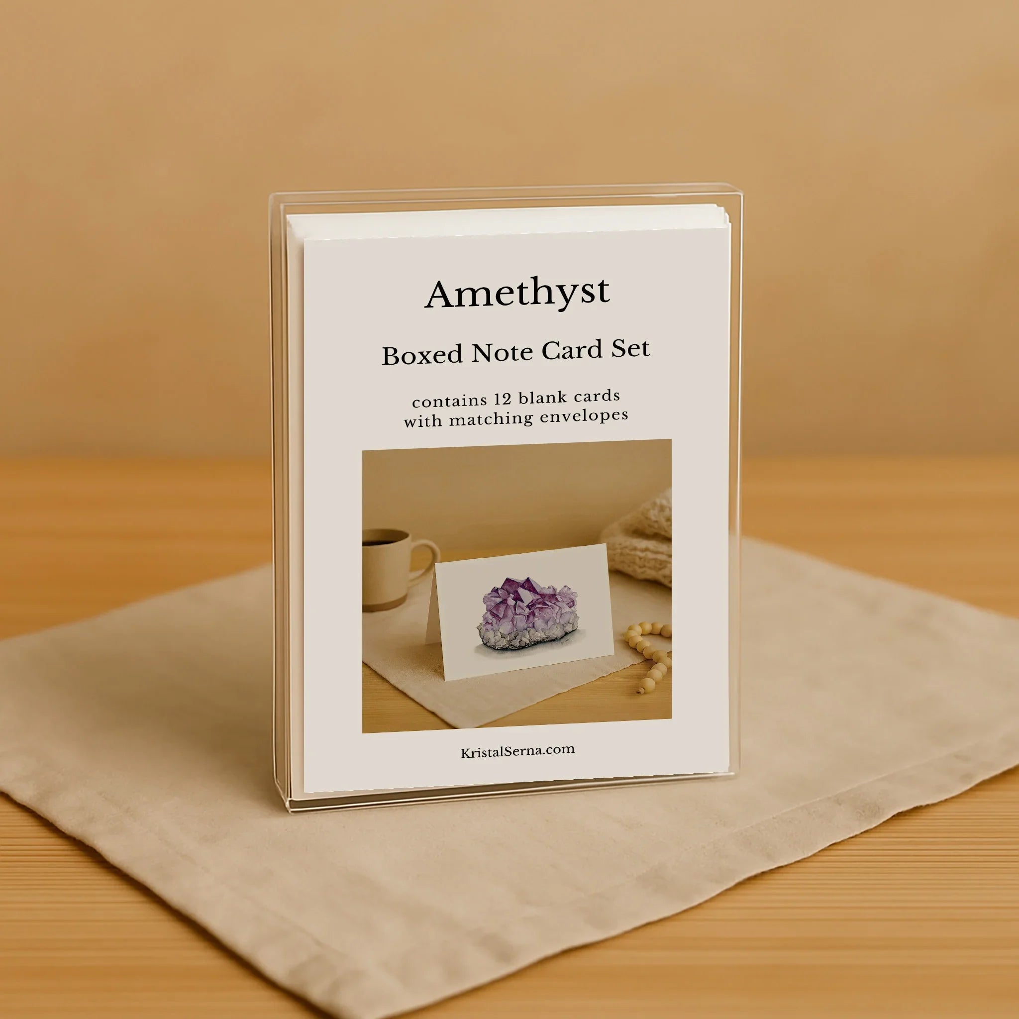 Amethyst themed boxed note card set on a wooden surface with a beige background