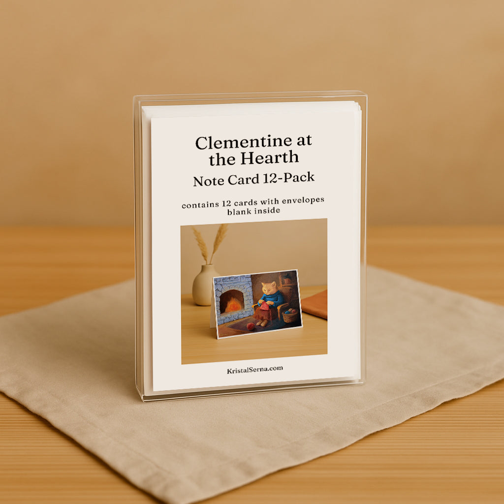 Note card set packaging titled 'Clementine at the Hearth' on a beige surface.