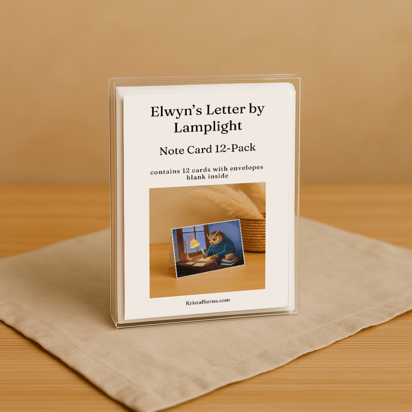 Note card set packaging with a cat illustration on a beige surface