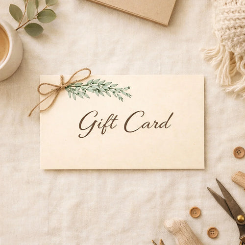 Gift card with decorative elements on a textured surface
