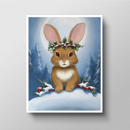Framed artwork of a rabbit with a floral crown in a snowy landscape
