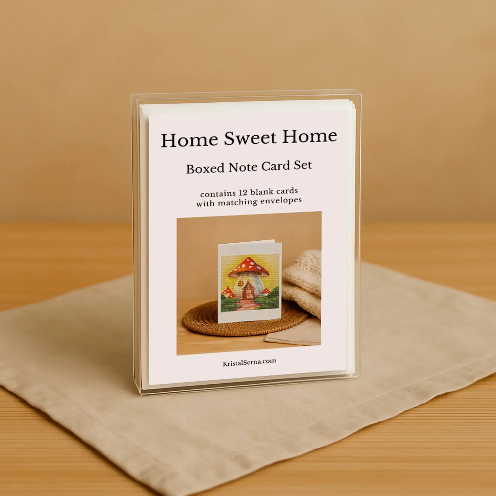 Boxed note card set with 'Home Sweet Home' text on a beige background