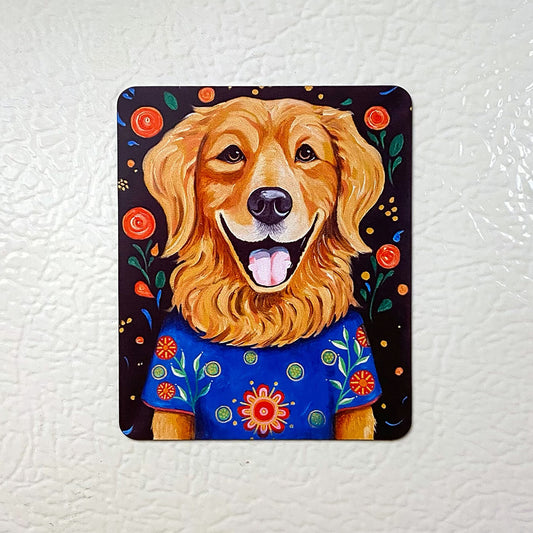 Colorful magnet of a dog with a blue shirt on a white background