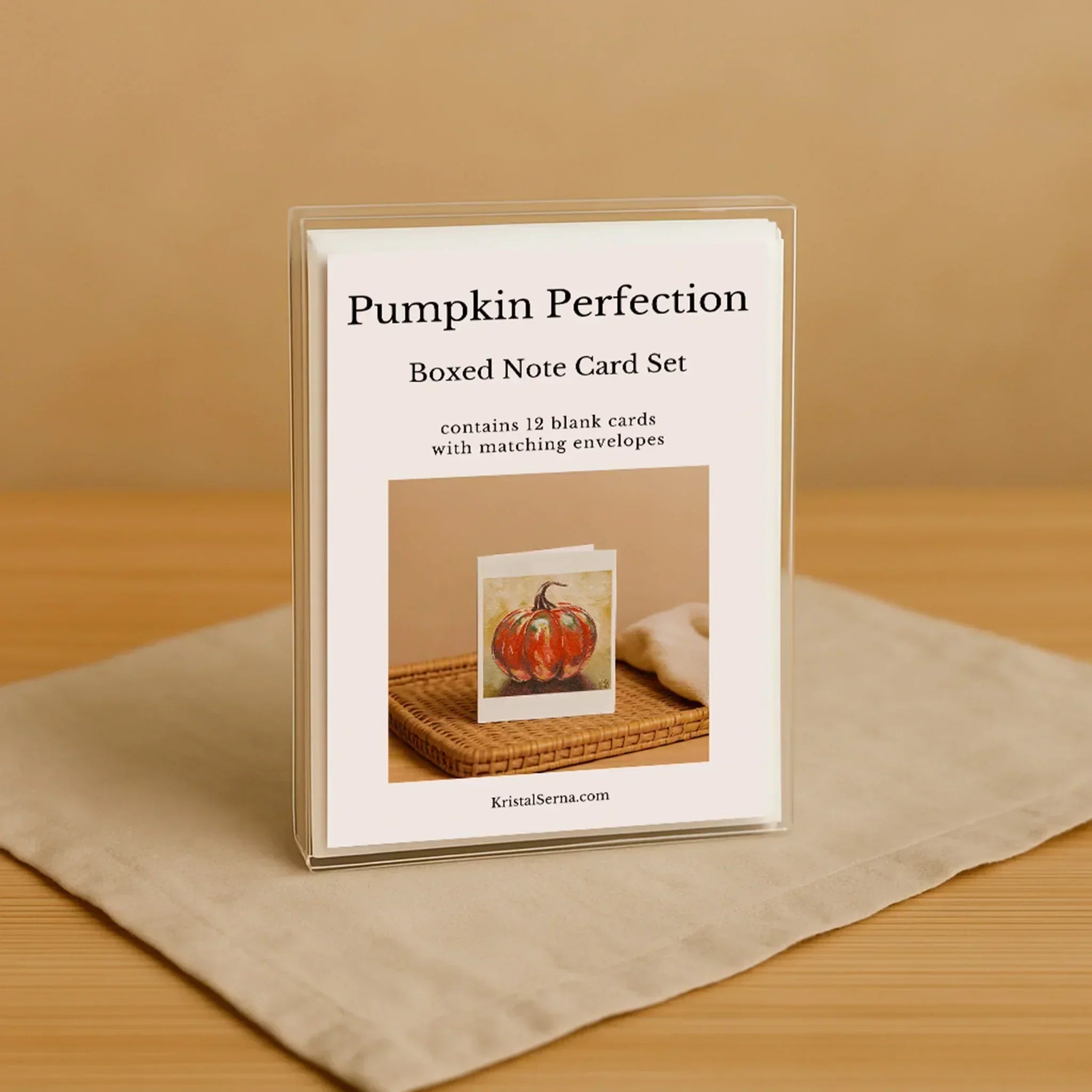 Pumpkin Perfection boxed note card set on a beige surface with a brown background