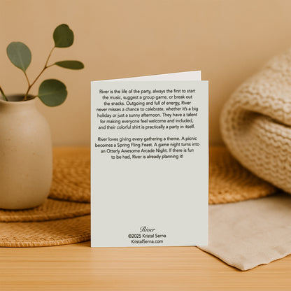 White card with text on a wooden surface with a plant and woven mat in the background