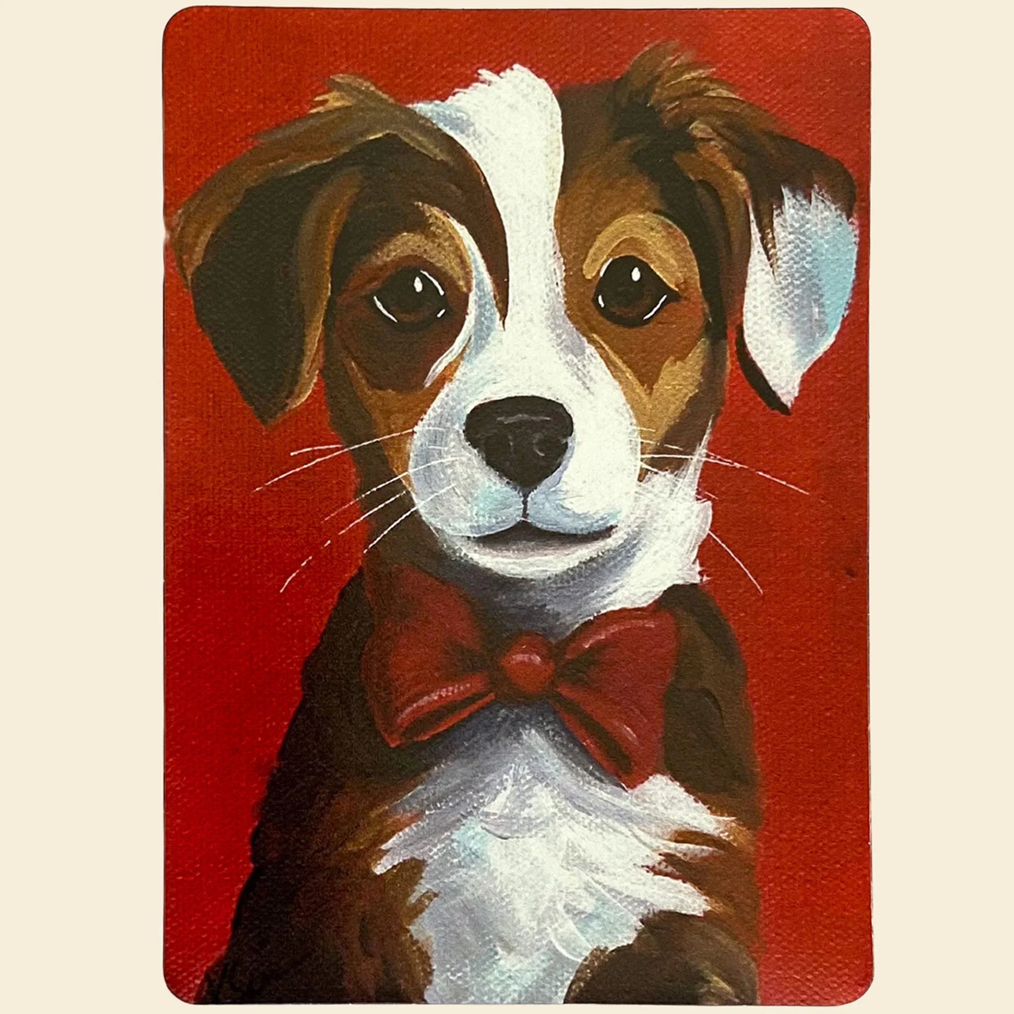 Magnet of a dog wearing a red bow tie on a red background