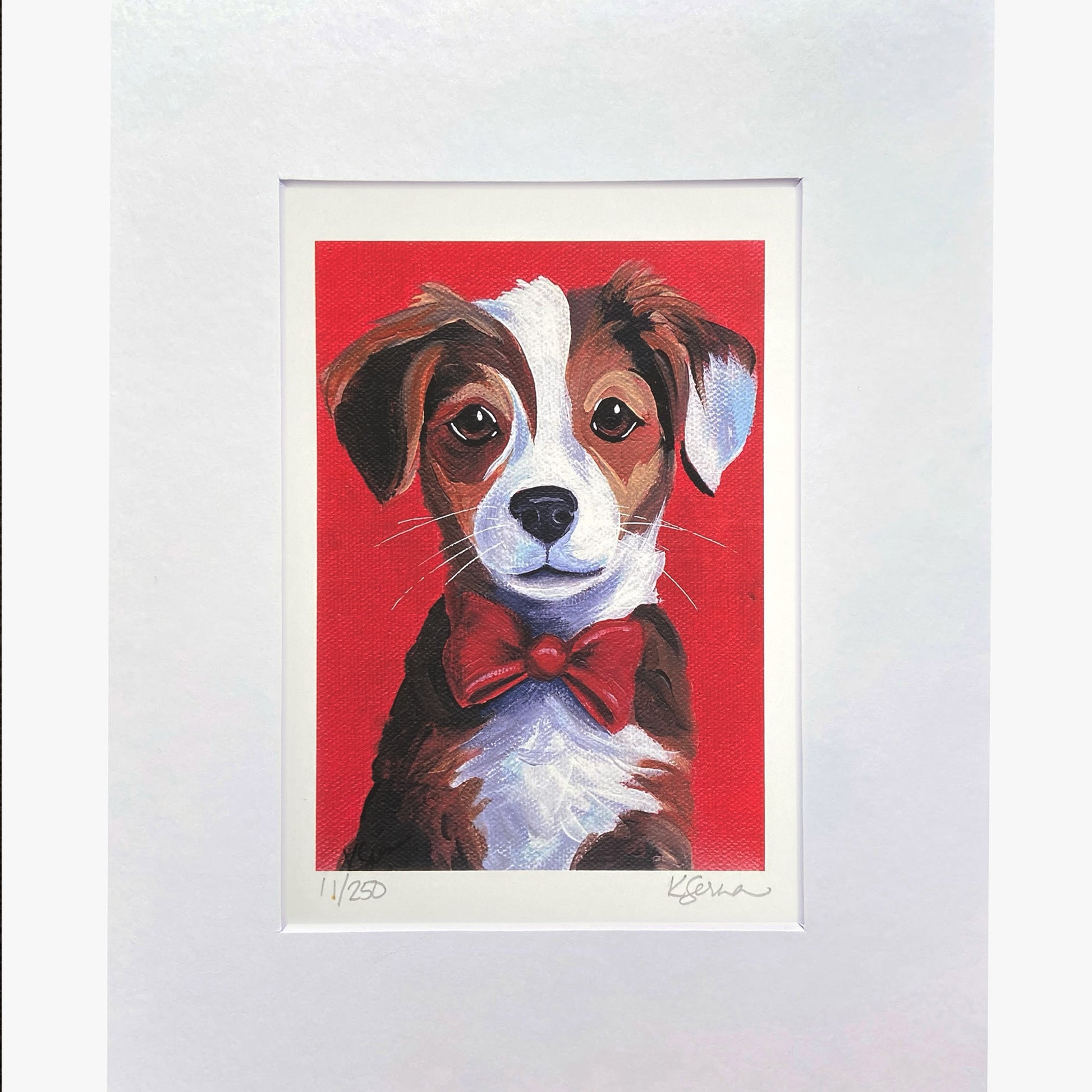 Framed artwork of a dog with a red bow tie on a red background