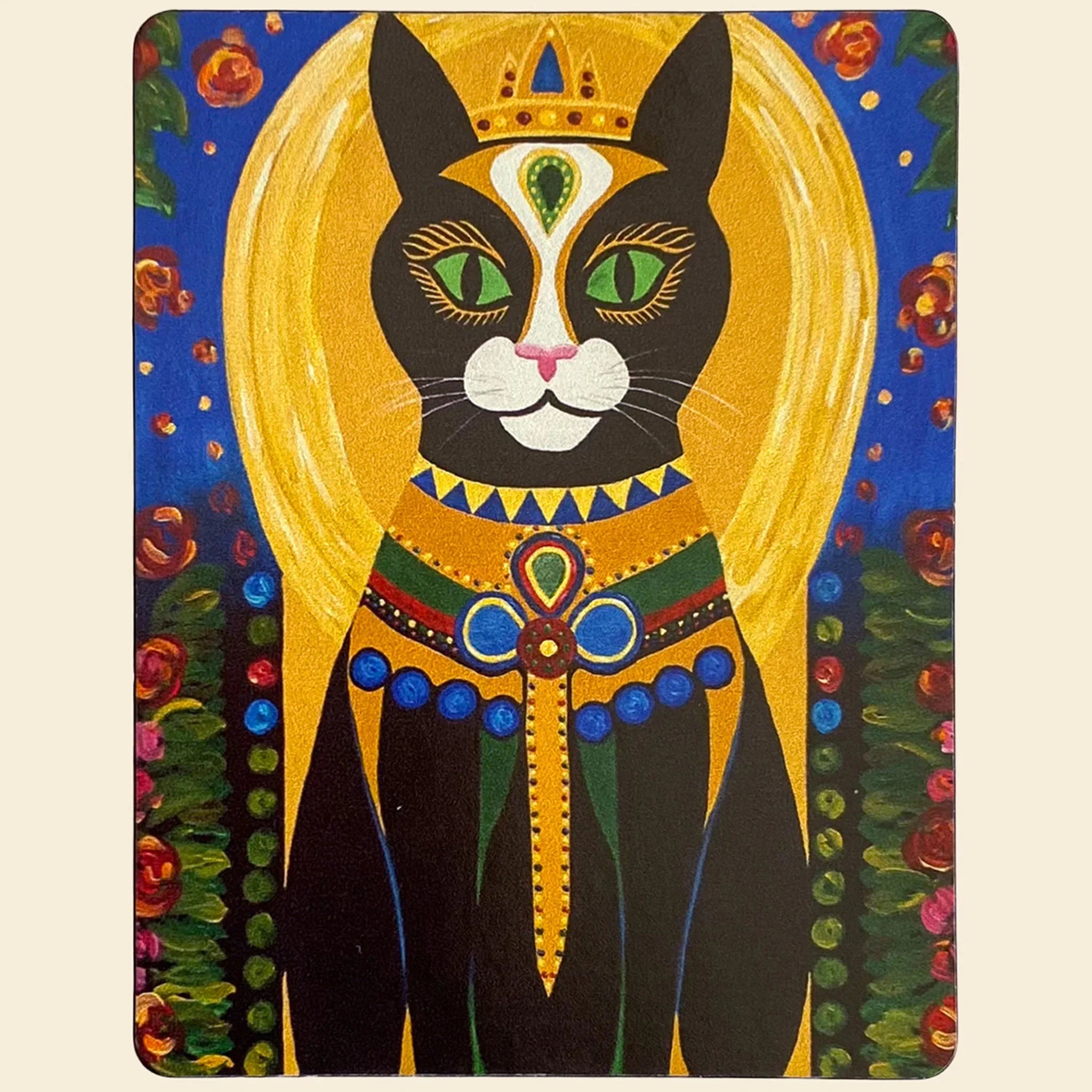 Magnet with a stylized cat illustration wearing a crown and colorful attire on a blue background.