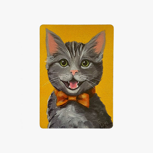 Painting of a cat wearing a bow tie on a yellow background