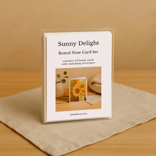 Sunny Delight boxed note card set on a wooden surface with a beige background