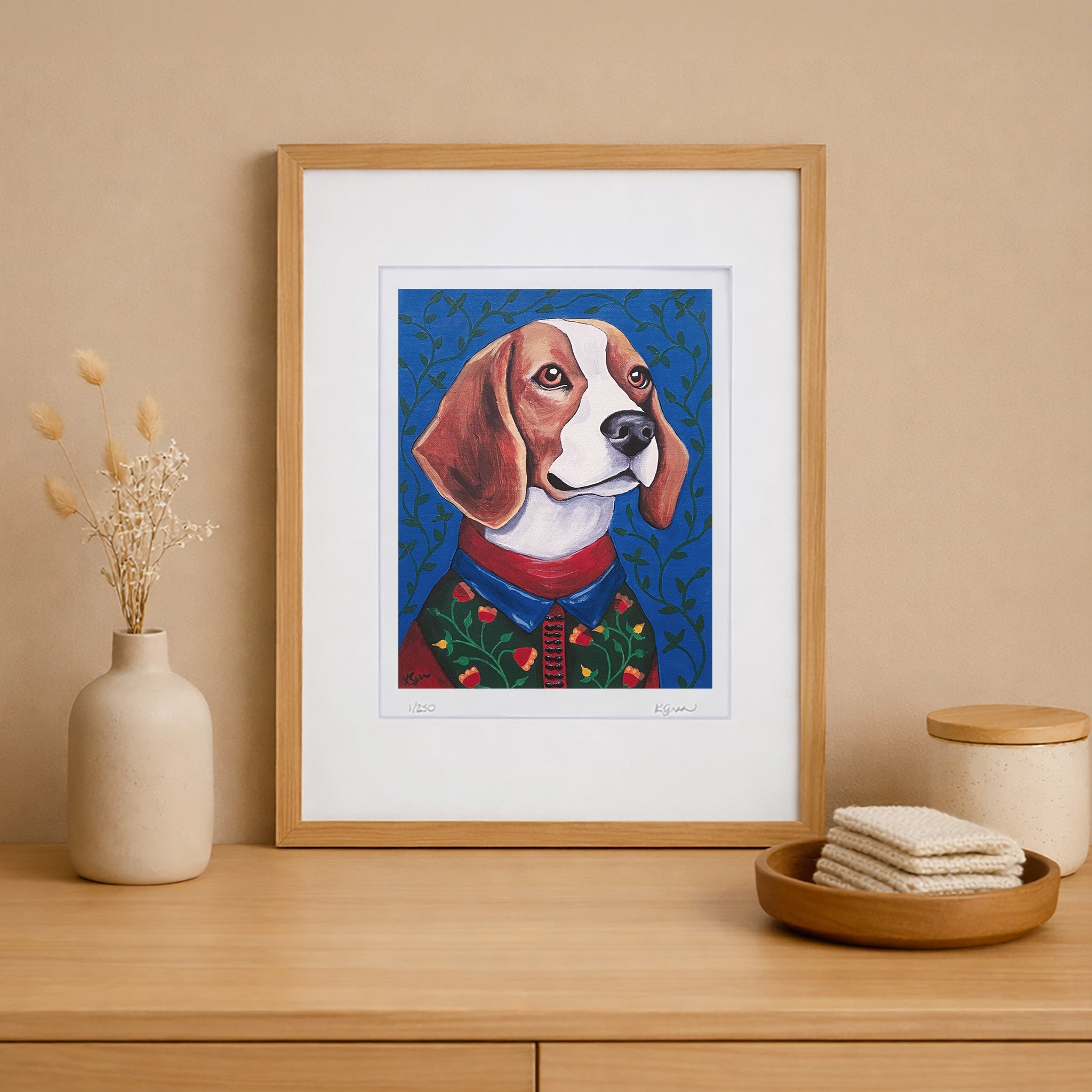 Framed artwork of a dog on a wooden shelf with decorative items.
