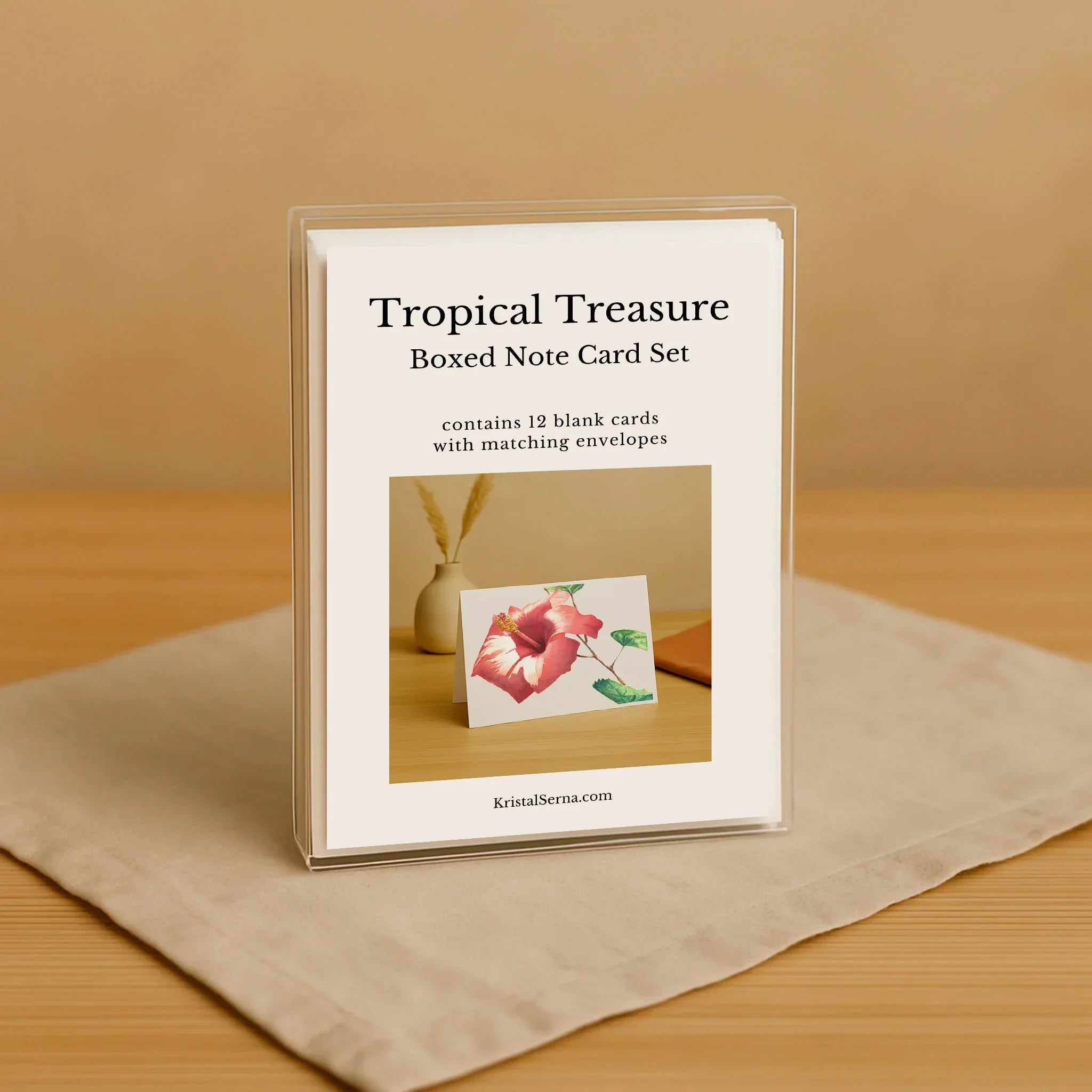 Tropical Treasure boxed note card set on a beige surface with a wooden background