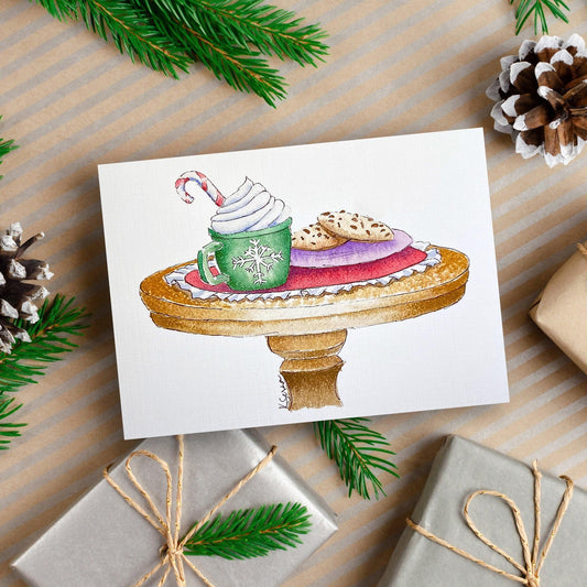 A cozy watercolor and ink painting of cookies and milk waiting for Santa, perfect for sending a warm Christmas greeting.